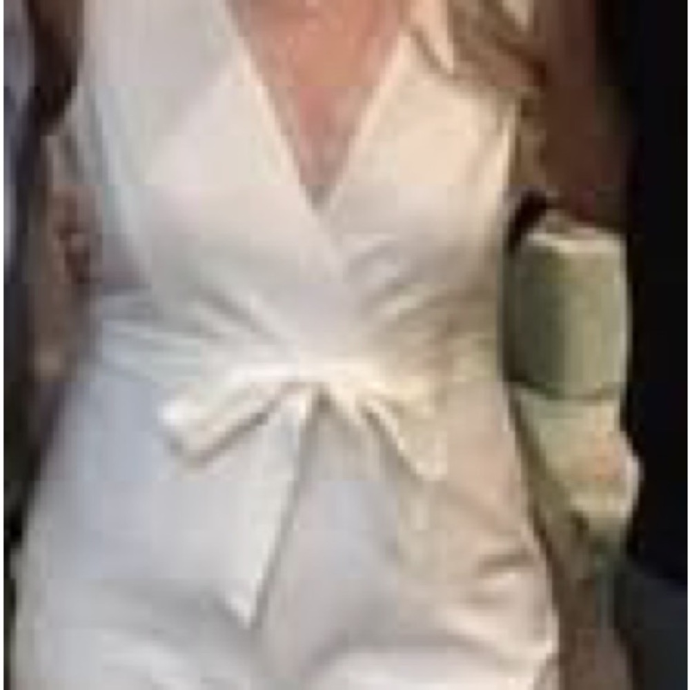 Elegant White Jumpsuit with Bow Detail